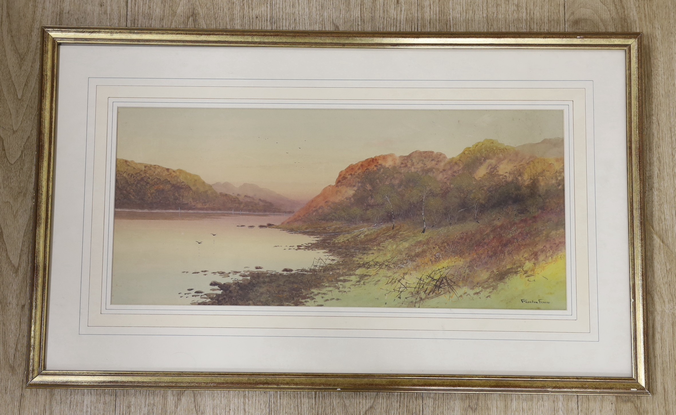 Francis Gordon Fraser (1879-1940), watercolour, Loch scene, signed, 24 x 53cm